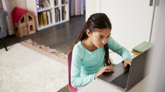girl on computer istock