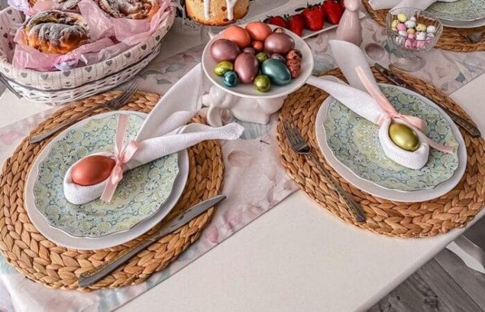 Easter table set up bunny napkins Easter eggs and pastry